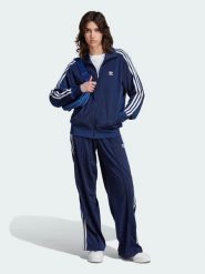 Adidas Spodnie dresowe "Firebird" w kolorze granatowym rozmiar: S. Niebieskie spodnie dresowe Adidas, s, bez wzorów, z dresówki. Za 145.26 zł.