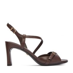 Sandały GINO ROSSI. Brązowe sandały Gino Rossi, bez wzorów, bez obcasa, na słupku, bez zapięcia. Za 379.99 zł.