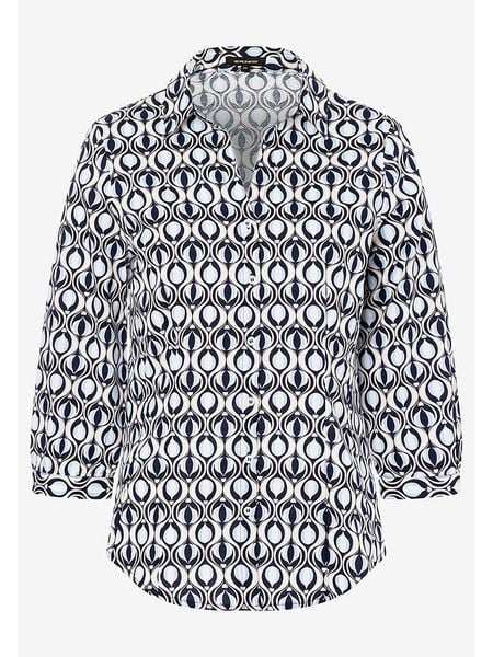 More & More Bluzka w kolorze błękitno-granatowo-białym rozmiar: 42. Białe bluzki More & More, bez wzorów, z bawełny, bez kołnierzyka, bez ramiączek. Za 100.75 zł.