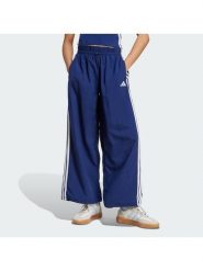 Adidas Spodnie dresowe Essentials 3-Stripes JV5328 Granatowy Loose Fit. Niebieskie spodnie dresowe Adidas, s, bez wzorów, z dresówki. Za 218.99 zł.