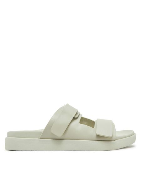 Calvin Klein Sandały HW0HW02489 Écru. Białe sandały Calvin Klein, bez wzorów, ze skóry, bez obcasa, na płaskiej podeszwie, bez zapięcia. Za 254.99 zł.