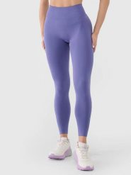 4F Legginsy funkcyjne w kolorze fioletowym rozmiar: M/L. Różowe legginsy 4f, l, bez wzorów, z materiału, na fitness i siłownię. Za 51.45 zł.