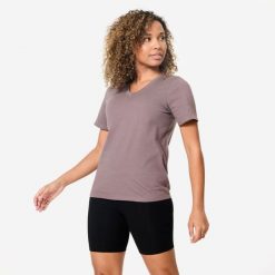 Koszulka z krótkim rękawem damska Domyos Gym & Pilates. Brązowe bluzki NYAMBA, s, bez wzorów, z bawełny, sportowe, bez kołnierzyka, bez ramiączek. Za 39.99 zł.