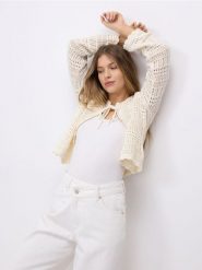 Ażurowy kardigan - kremowy. Białe kardigany Reserved, l, w ażurowe wzory, z bawełny. Za 119.99 zł.