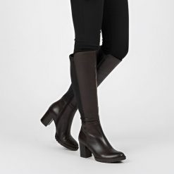 Kozaki damskie Grace, wysoka smukła cholewka ze skóry licowej z elastycznym ściągaczem i wysokim stabilnym obcasem, brązowe, 05110-2-231-T-93-3. Brązowe kozaki Grace, z materiału, bez obcasa, na obcasie, bez zapięcia. Za 499.00 zł.