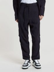 G-Star Spodnie w kolorze granatowym rozmiar: W30. Niebieskie spodnie materiałowe G-Star, bez wzorów, z materiału. Za 319.95 zł.