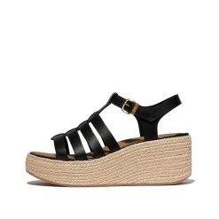 Klapki na koturnie w stylu rybaka damskie FitFlop Platfforms. Czarne klapki FIT FLOP, bez wzorów, bez obcasa, na koturnie. Za 695.00 zł.