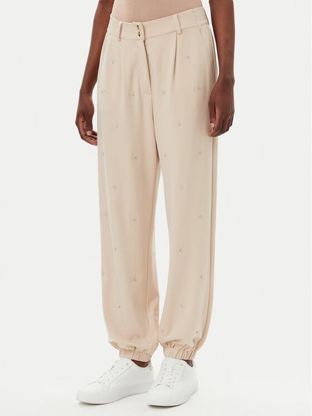 Liu Jo Sport Spodnie dresowe TA5193 J5942 Beżowy Relaxed Fit. Brązowe spodnie dresowe Liu Jo Sport, xs, bez wzorów, z bawełny. Za 359.99 zł.