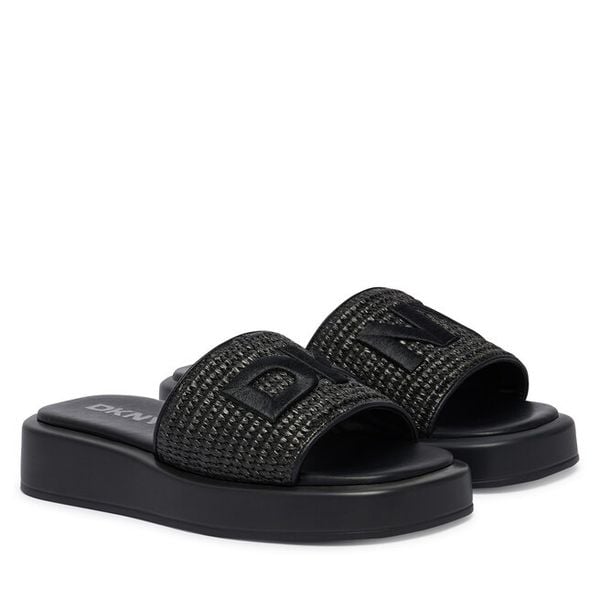 Klapki DKNY. Czarne klapki DKNY, bez wzorów, bez obcasa. Za 579.99 zł.