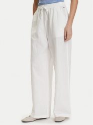 Tommy Jeans Spodnie materiałowe DW0DW22285 Biały Loose Fit. Białe spodnie materiałowe Tommy Jeans, xl, bez wzorów, z jeansu. Za 409.99 zł.