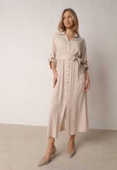 Jasnobeżowa Bawełniana Sukienka Koszulowa w Stylu Safari z Wiązanym Paskiem Atusea. Brązowe sukienki Born2be, na co dzień, l, bez wzorów, z bawełny, casualowe, bez kołnierzyka, bez ramiączek, maxi, koszulowe. Za 159.99 zł.