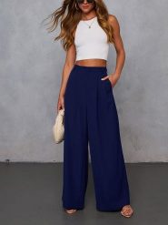 Milan Kiss Spodnie w kolorze granatowym rozmiar: XL. Niebieskie spodnie materiałowe Milan Kiss, xl, bez wzorów, z materiału. Za 135.49 zł.