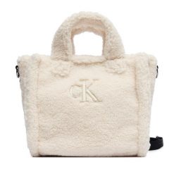 Torebka Calvin Klein Jeans. Brązowe shopper Calvin Klein Jeans, bez wzorów, z jeansu, bez dodatków. Za 209.99 zł.