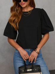 Milan Kiss Bluzka w kolorze czarnym rozmiar: XL. Czarne bluzki Milan Kiss, xl, bez wzorów, bez kołnierzyka, bez ramiączek. Za 131.74 zł.