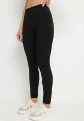 Czarne Klasyczne Legginsy z Bawełny Zivolea. Czarne legginsy Born2be, l, bez wzorów, z bawełny. Za 29.99 zł.