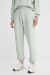 GUESS Zielone spodnie dresowe damskie Primula. Zielone spodnie dresowe Guess, s, z aplikacjami, z dresówki. W wyprzedaży za 239.99 zł.