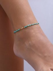 Luja Bijoux Pozłacana bransoletka z kryształami na kostkę rozmiar: onesize. Niebieskie bransoletki Luja Bijoux, z kryształem, pozłacane. Za 61.45 zł.