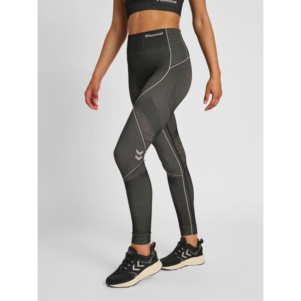 Damskie legginsy mid-rise Hummel MT Mila. Czarne legginsy Hummel, xs, bez wzorów, na jogę i pilates. Za 202.00 zł.