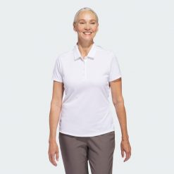 Koszulka polo Women's Solid Performance Short Sleeve. Białe koszulki polo Adidas, s, bez wzorów, z materiału, bez kołnierzyka, bez ramiączek. Za 229.00 zł.