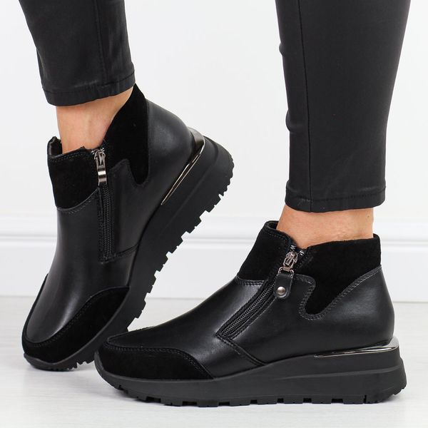 Czarne skórzane botki damskie Filippo dbt6348/24. Czarne botki Filippo, na jesień, bez wzorów, z polaru, z okrągłym noskiem, bez obcasa, bez zapięcia. W wyprzedaży za 257.14 zł.