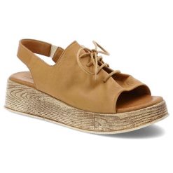 Sandały damskie Artiker, na drewnopodobnej platformie skórzane z wiązaną cholewką wsuwane, brązowe, 56C0287. Brązowe sandały Artiker, bez wzorów, ze skóry, biznesowe, bez obcasa, na koturnie, bez zapięcia. Za 179.00 zł.