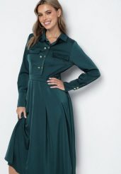 Zielona Rozkloszowana Sukienka o Koszulowym Kroju z Imitacją Kieszeni i Gumką w Talii Rizza. Zielone sukienki Born2be, na co dzień, l, bez wzorów, eleganckie, bez kołnierzyka, bez ramiączek, koszulowe. Za 149.99 zł.