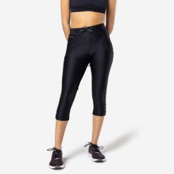 Legginsy do biegania krótkie damskie Kiprun Run 500 Dry. Czarne legginsy KIPRUN, xs, bez wzorów, z materiału, krótkie. Za 89.99 zł.