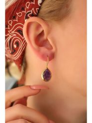 Pierres delicates Pozłacane kolczyki z ametystami rozmiar: onesize. Żółte kolczyki Pierres delicates, z ametystem, pozłacane, z zapięciem typu bigiel. Za 48.05 zł.