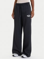 New Balance Spodnie dresowe WP53902 Czarny Relaxed Fit. Czarne spodnie sportowe New Balance, xl, bez wzorów, z bawełny. Za 276.40 zł.