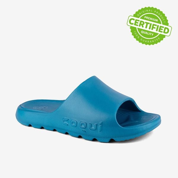 Klapki damskie Coqui Lou. Brązowe klapki Coqui, bez wzorów, z materiału, bez obcasa. Za 121.99 zł.