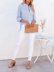 Milan Kiss Bluzka w kolorze błękitnym rozmiar: L. Niebieskie bluzki Milan Kiss, l, bez wzorów, bez kołnierzyka, bez ramiączek. Za 165.99 zł.