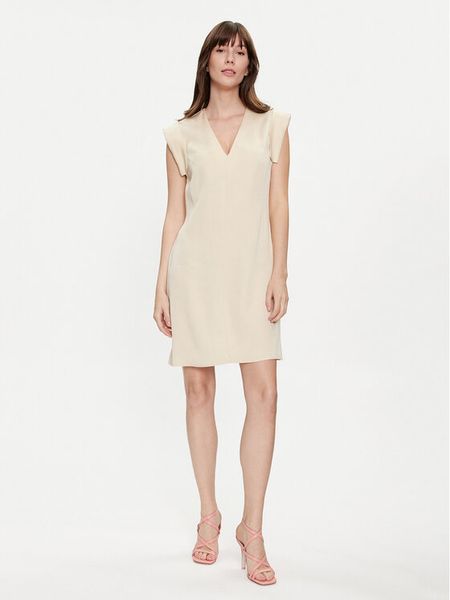 United Colors Of Benetton Sukienka codzienna 46M4DV08O Beżowy Slim Fit. Brązowe sukienki United Colors of Benetton, na co dzień, m, bez wzorów, z lyocellu, bez kołnierzyka, bez ramiączek, proste. Za 179.99 zł.