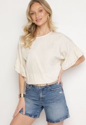 Beżowa Bluzka z Wiskozą Typu Nietoperz z Falbankami Davienna. Brązowe bluzki Born2be, uniwersalny, bez wzorów, z jeansu, eleganckie, bez kołnierzyka, bez ramiączek. W wyprzedaży za 67.99 zł.
