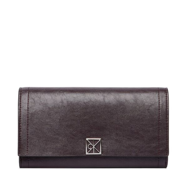 Portfel Calvin Klein. Brązowe portfele Calvin Klein, bez wzorów. Za 329.99 zł.