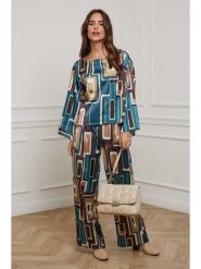 L'armoire de Suzette Bluzka w kolorze turkusowym rozmiar: 38/40. Niebieskie bluzki L'armoire de Suzette, l, bez wzorów, klasyczne, bez kołnierzyka, bez ramiączek. Za 69.99 zł.