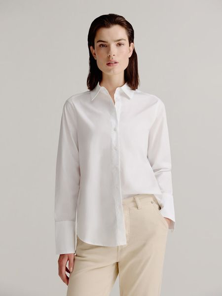 Josephine & Co Bluzka "Levi" w kolorze białym rozmiar: 42. Białe bluzki Josephine & Co, bez wzorów, z lyocellu, bez kołnierzyka, bez ramiączek. Za 194.95 zł.