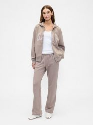 GAP Spodnie dresowe w kolorze beżowym rozmiar: XL. Brązowe spodnie sportowe GAP, xl, bez wzorów, z dresówki. Za 91.77 zł.