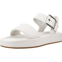 Sandały CLARKS ALDA STRAP Biały. Białe sandały Clarks, bez wzorów, ze skóry, bez obcasa, bez zapięcia. Za 407.99 zł.