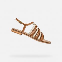 Sandały GEOX D MADDALUSIAC Brązowy. Brązowe sandały Geox, bez wzorów, ze skóry, bez obcasa, bez zapięcia. Za 315.99 zł.