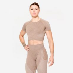 Koszulka fitness damska Domyos krótki rękaw crop top. Brązowe biustonosze DOMYOS, bez wzorów, z materiału. W wyprzedaży za 59.99 zł.