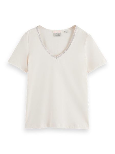 Scotch & Soda Koszulka w kolorze kremowym rozmiar: XS. Brązowe bluzki Scotch & Soda, xs, z aplikacjami, z bawełny, bez kołnierzyka, bez ramiączek. Za 56.93 zł.