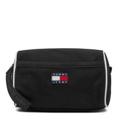 Kosmetyczka Tommy Jeans. Czarne kufry i kosmetyczki Tommy Jeans, bez wzorów, z jeansu, bez dodatków. Za 199.99 zł.
