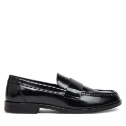 Lordsy Calvin Klein. Czarne lordsy Calvin Klein, bez wzorów, bez obcasa, bez zapięcia. Za 349.99 zł.