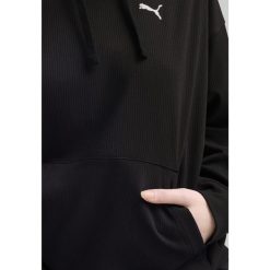 Damska wygodna prążkowana bluza z kapturem ESS ELEVATED PUMA Black. Czarne bluzy Puma, xl, bez wzorów, prążkowane, z kapturem. W wyprzedaży za 114.00 zł.