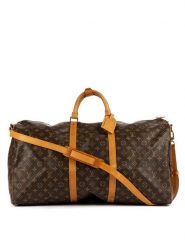 Louis Vuitton Torba podróżna w kolorze brązowym - 60 x 33 x 26 cm rozmiar: onesize. Brązowe torby na ramię Louis Vuitton, bez wzorów, z materiału, przez ramię. Za 5,842.99 zł.