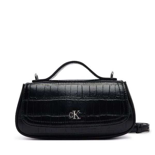 Torebka Calvin Klein. Czarne torebki klasyczne Calvin Klein, bez wzorów, bez dodatków. Za 449.99 zł.