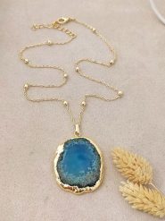 Luja Bijoux Pozłacany naszyjnik z zawieszką - dł. 42 cm rozmiar: onesize. Niebieskie naszyjniki Luja Bijoux, z agatem, pozłacane. Za 101.23 zł.