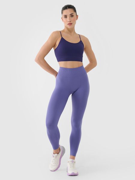4F Legginsy treningowe bezszwowe damskie - granatowe XS/S. Niebieskie legginsy 4f, l, bez wzorów, z dzianiny, z podwyższonym stanem, na fitness i siłownię. W wyprzedaży za 79.99 zł.