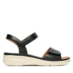 Sandały Josef Seibel. Czarne sandały Josef Seibel, bez wzorów, bez obcasa, na koturnie, bez zapięcia. Za 399.99 zł.