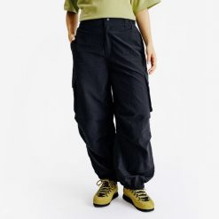 Spodnie cargo damskie. Czarne spodnie dresowe DECATHLON, xl, bez wzorów, z dresówki. Za 179.99 zł.